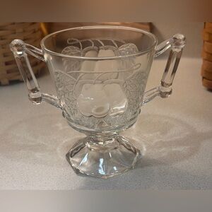 Vintage clear Jeannette Glass Baltimore Pear footed sugar bowl.